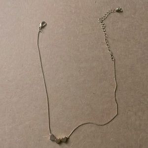 Golden necklace with hearts